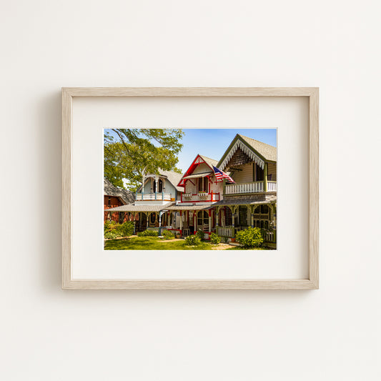 Photograph showing the gingerbread cottages on Martha's Vineyard, in Oak Bluffs shown framed on a wall