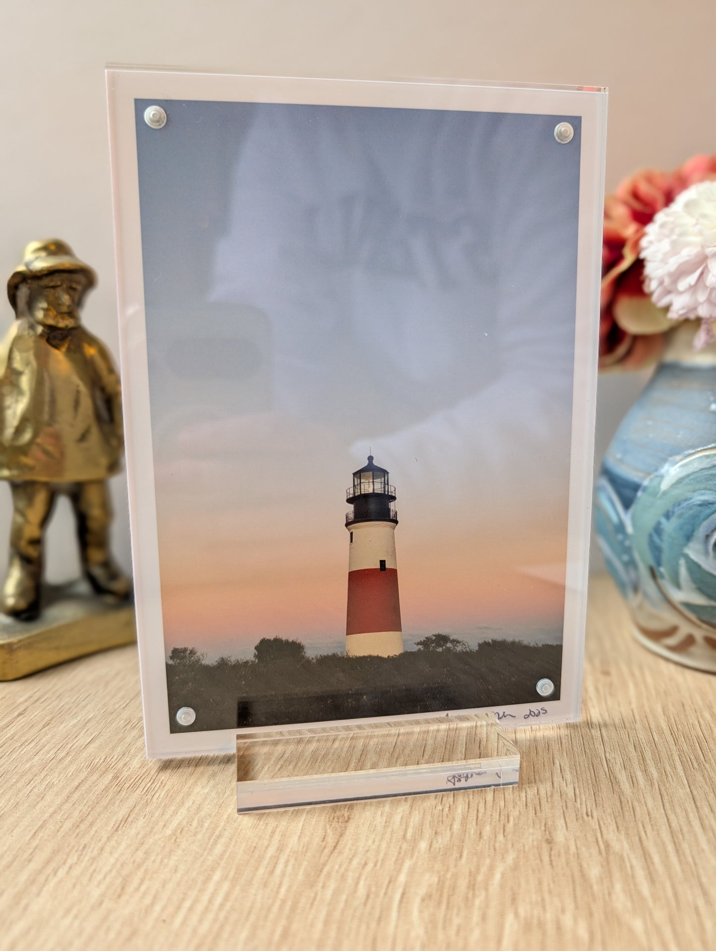 5x7 acrylic framed print of Sankaty Head Lighthouse displayed on desk, modern office decor