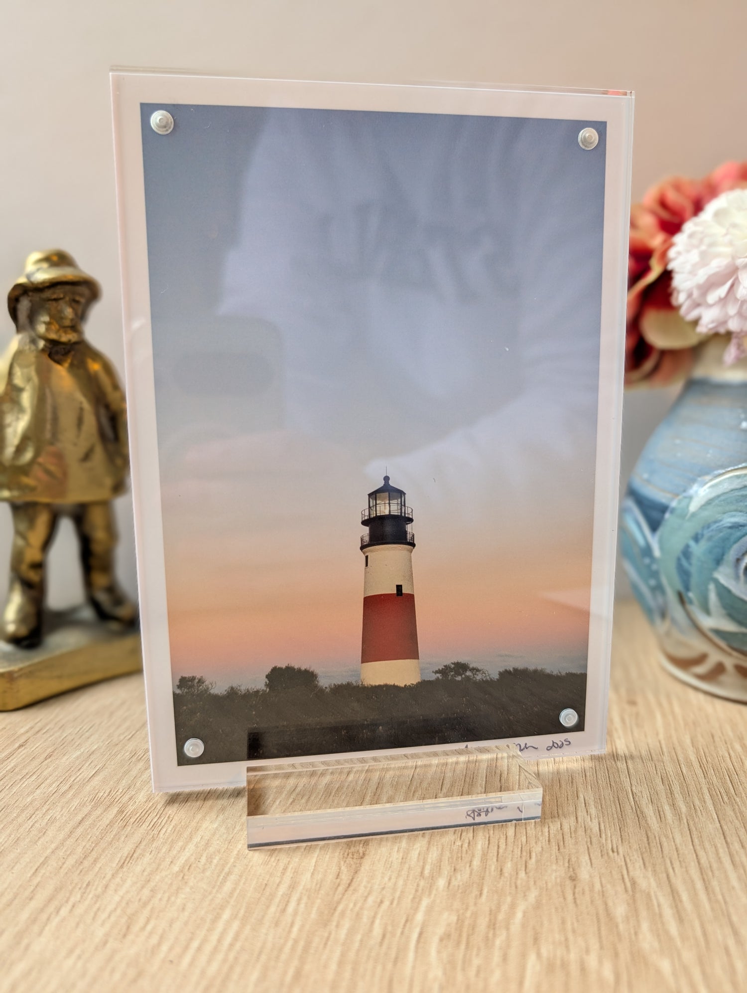 5x7 acrylic framed print of Sankaty Head Lighthouse displayed on desk, modern office decor