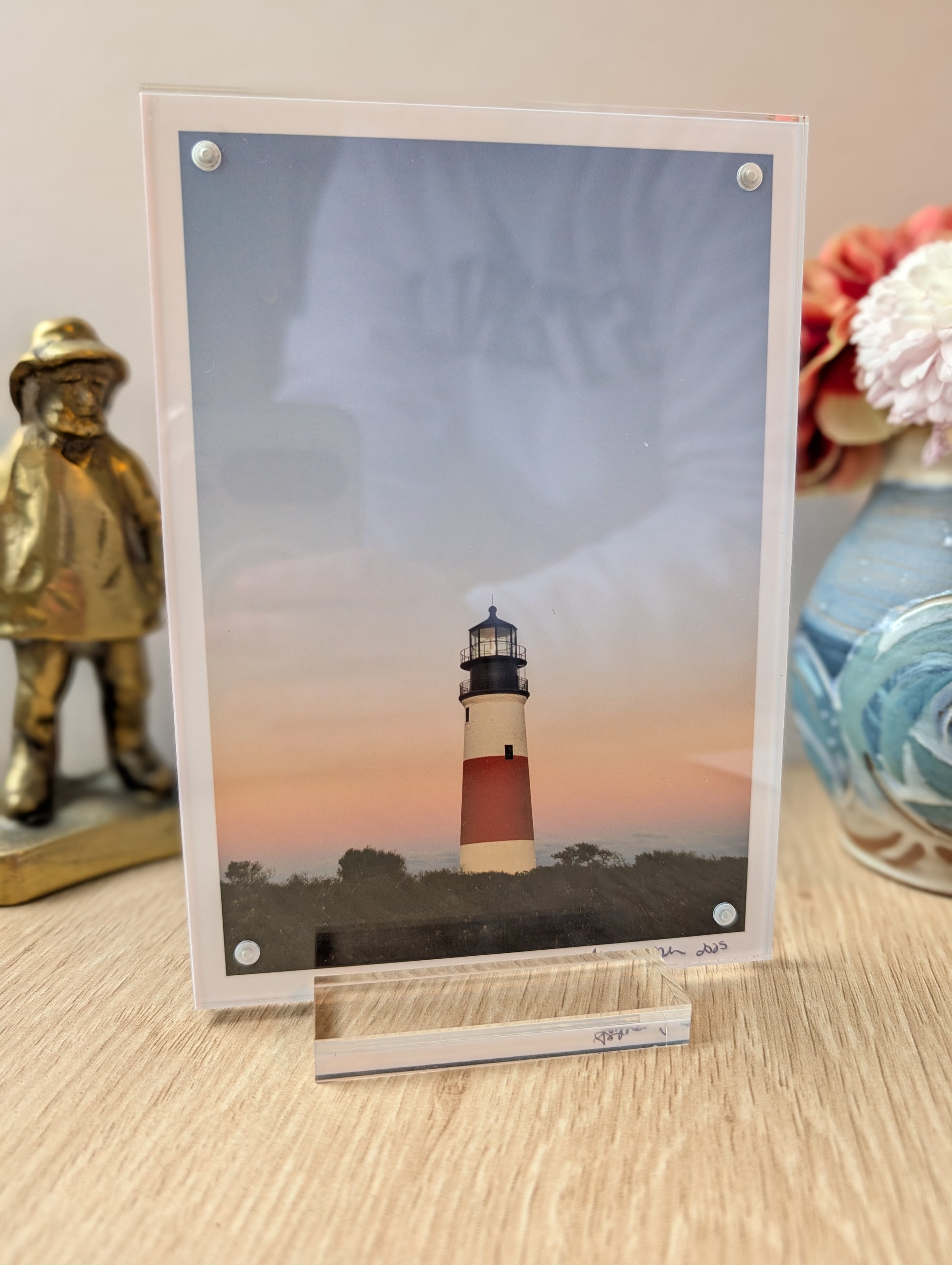 5x7 acrylic framed print of Sankaty Head Lighthouse displayed on desk, modern office decor